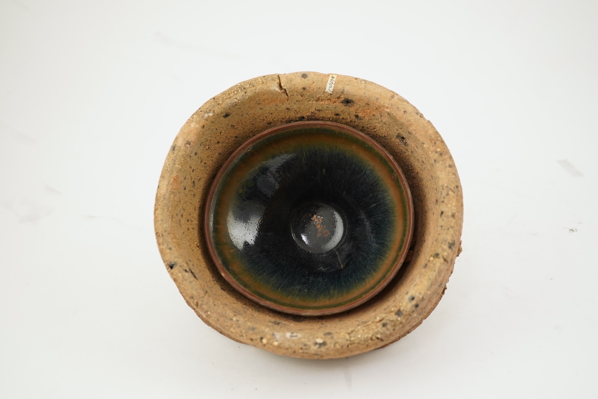 A Chinese Jian ware hare's fur bowl and saggar, Song dynasty